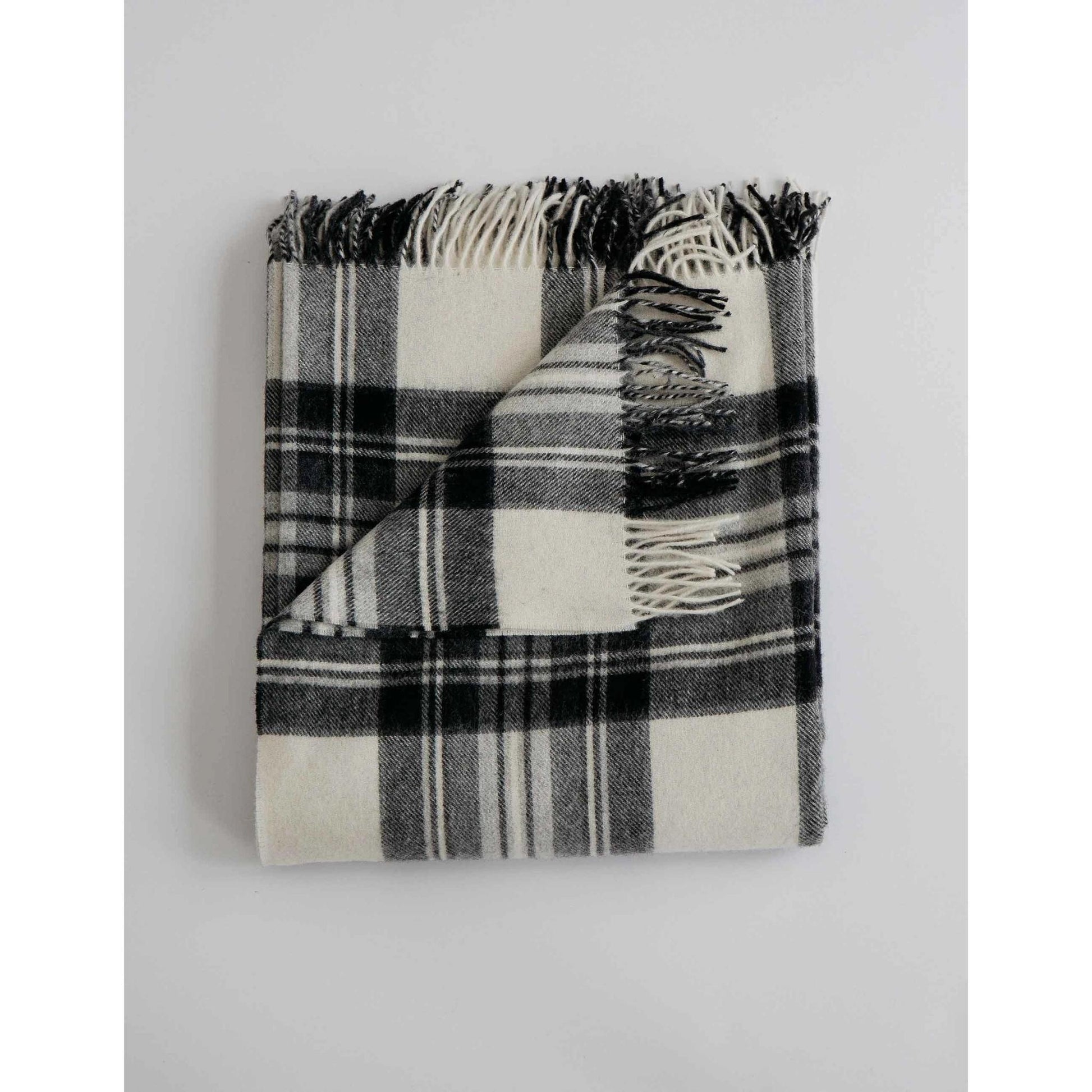 Cozy 100% Merino Lambswool throw blanket in black and pearl check pattern