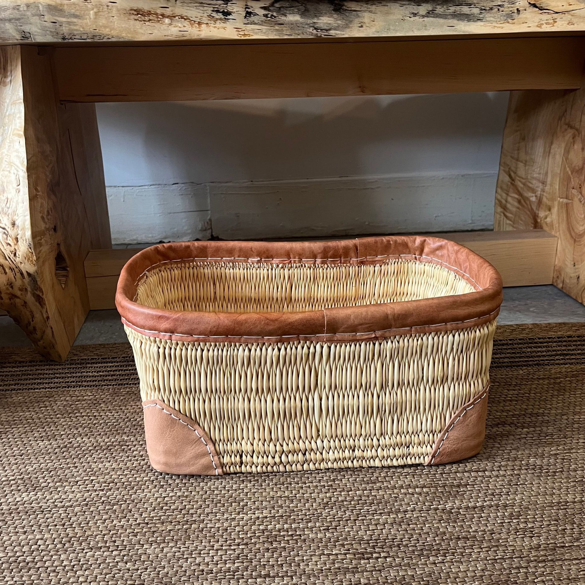 Small woven palm and leather-trimmed rectangular storage basket
