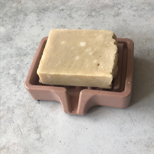 Concrete Soap Dish with Drain in rose color and a piece of soap