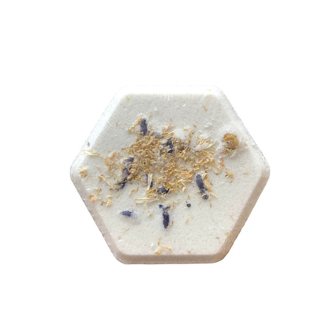 Bath bomb made of milk, honey, butters and pure essential oil of lavender, chamomile and frankincense