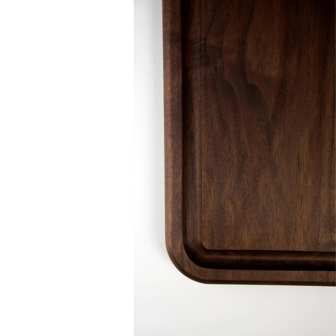 Detail of oversized rectangular carving board in walnut wood