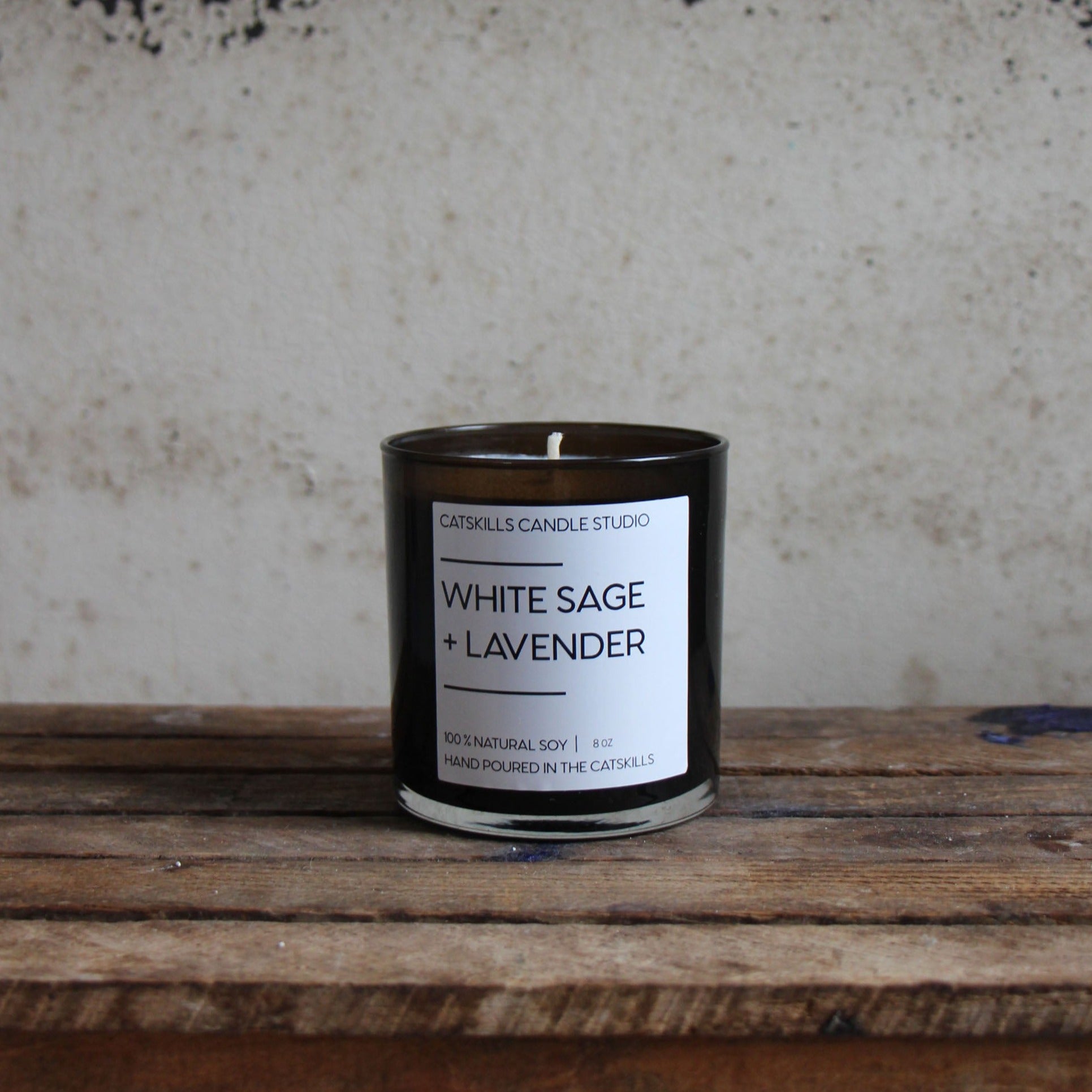 9-ounce hand-poured jar candle with lid made of natural soy and scents of lavender, sage, cedar, and sandalwood